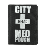 M-Tac City Med Pouch Hex i sort, kompakt førstehjælpskit med velcro lukning og medicinsk kors på forsiden.