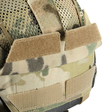 M‑Tac Hjelmcover Shroud Elite, MULTICAM camouflagemønster, designet til TOR-D hjelme, med velcro-paneler og stropper til ekstra kamuflage.