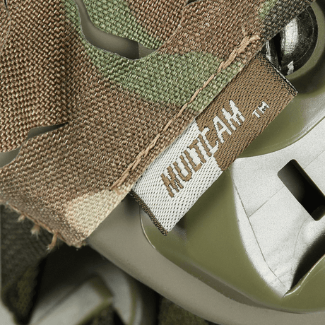 M‑Tac Vilha Hjelmcover FAST i Multicam mønster, lavet af slidstærkt Cordura 500D, designet til camouflage og beskyttelse på hjelme.