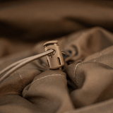 Detalje af snorstoppersystem på M-Tac Sukharka Gen.3 Pouch lavet af holdbart Cordura 500D materiale.