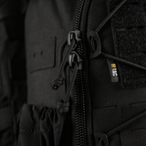 M-Tac STURM Elite Rygsæk med laser skåret MOLLE frontpanel, nærbillede af lynlås og detaljering, fremstillet af Cordura materiale.