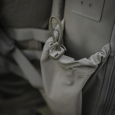 M-Tac STURM Elite Rygsæk med elastisk sidelomme og holdbar Cordura-konstruktion, ideel til taktisk brug og feltudstyr.
