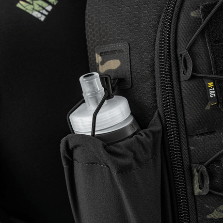 M-Tac STURM Elite Rygsæk med elastisk sidelomme og vandflaske, designet til taktisk brug.