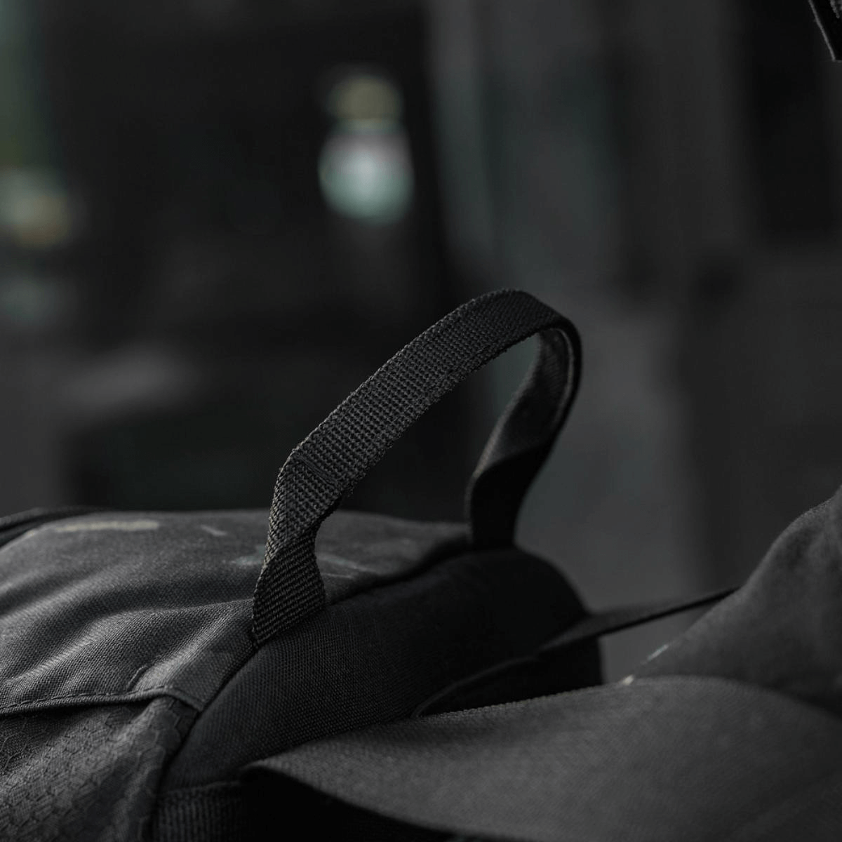 M-Tac STURM Elite Rygsæk i Cordura-materiale med MOLLE Laser Cut design og elastiske sidelommer til taktisk udstyr.