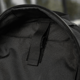 Indvendig visning af M-Tac STURM Elite Rygsæk viser rummeligt hovedrum designet til holdbarhed og alsidighed i taktiske situationer.