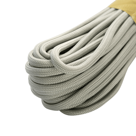M‑Tac Paracord 550 Type III 15 m stærk nylonkordel i grå, ideel til friluft, reparationer og nødbrug, med 7 indre nylontråde.