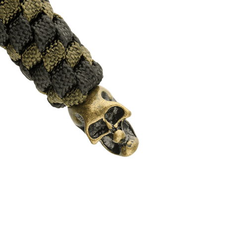 M-Tac Knife Lanyard Helix Skull i flettet paracord med en metal kranie, designet til at give stil og funktionalitet til lommeknive.