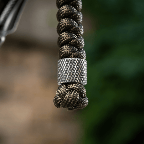 M-Tac Viper Lanyard Stainless Steel med flettet paracord og rustfri stålperle, fleksibelt knivtilbehør til hurtig adgang.