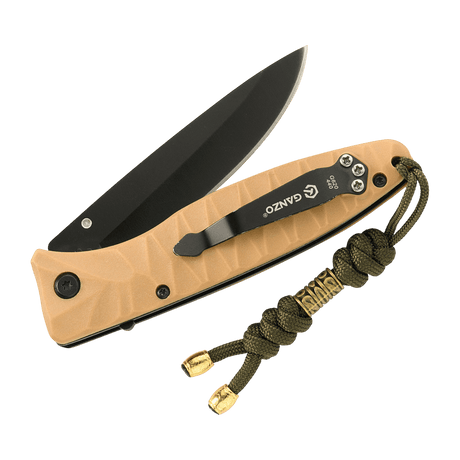 M-Tac Zeus Lanyard i flettet paracord på en foldekniv, stilfuldt og praktisk tilbehør, der fremhæver værktøjet og giver hurtig adgang.