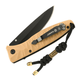 M-Tac Zeus Lanyard i flettet paracord med stilfuldt design fastgjort til en kniv for hurtig adgang og praktisk håndtering.