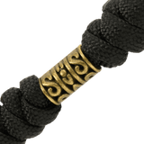 M-Tac Zeus Lanyard i flettet paracord med messingdetalje, ideel til hurtig adgang til kniv og udstyr, stilfuldt og fleksibelt design.