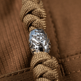 M-Tac Zeus Stainless Steel Lanyard med flettet paracord og dekorativ perle, ideel til hurtig adgang til kniv og udstyr.