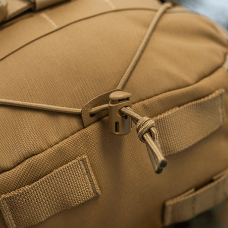 M-Tac Rygsæk Sturm Elite Gen.II nærbillede af elastisk snøring og stropper, fremstillet i holdbart Cordura materiale.
