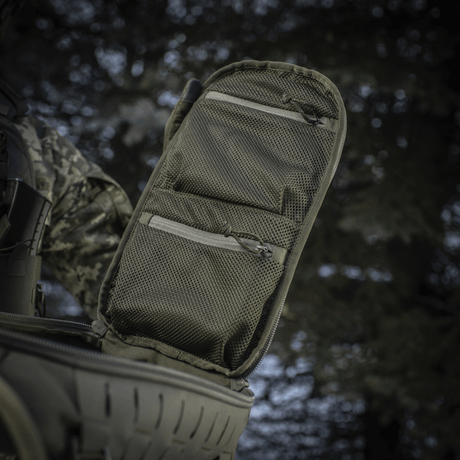 Åben lomme på M-Tac Rygsæk Sturm Elite Gen.II med netlommer til EDC-udstyr, ideel til feltophold og ekstraudstyr.