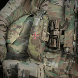 M-Tac Lomme til Tourniquet Closed i camouflage look, ideel til beskyttelse og opbevaring af tourniquet under taktiske operationer.