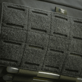 Nærbillede af M-Tac Admin Pouch Large Elite med velcro-panel, lavet af holdbart Cordura-materiale.