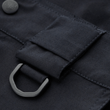 Detalje af M-Tac Shorts Aggressor Gen.II Flex i sort rip-stop materiale med D-ring og knap.