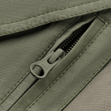 Lukning på M-Tac Shorts Aggressor Gen.II Flex med vand- og smudsafvisende rip-stop materiale.