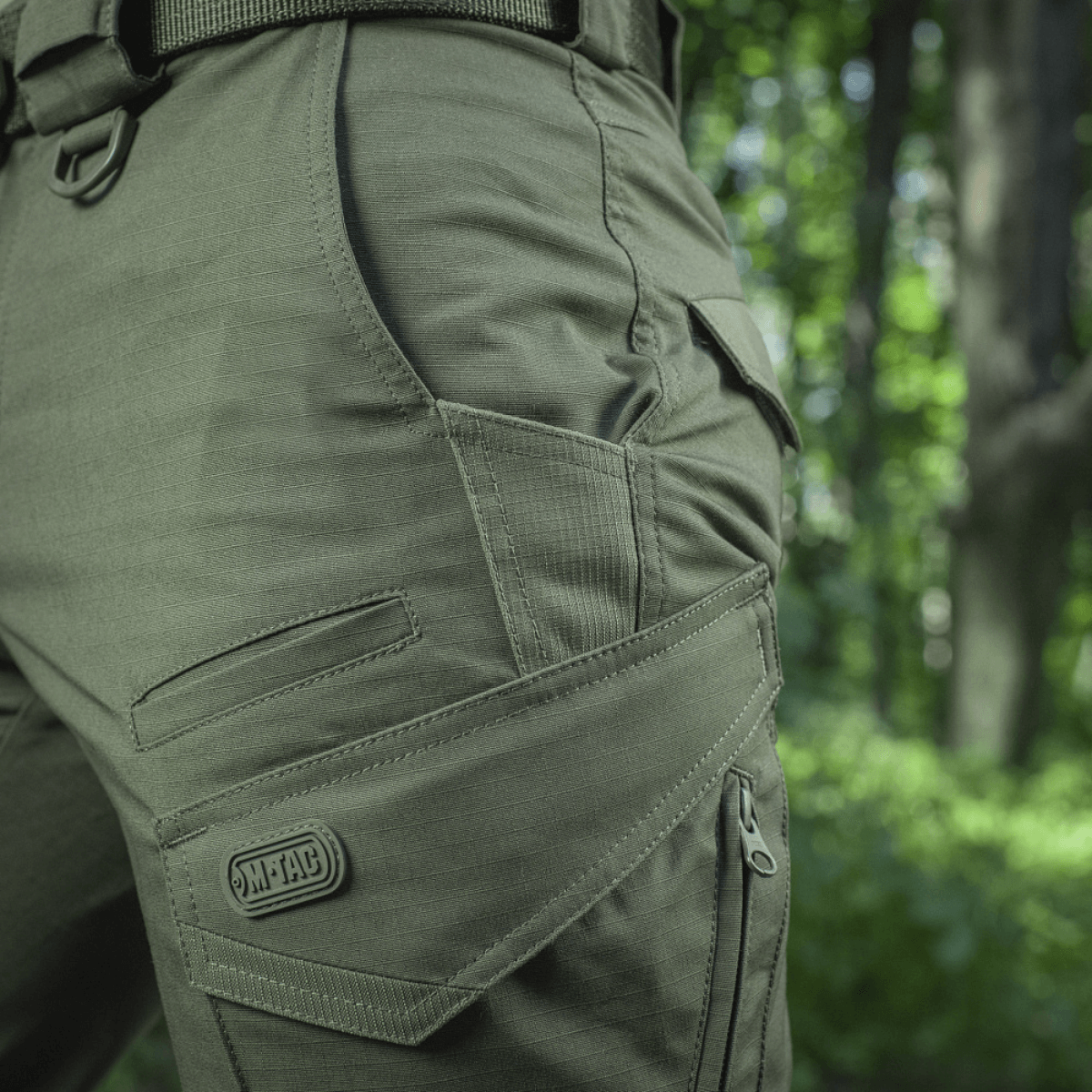 M-Tac Shorts Aggressor Gen.II Flex i skov, let og holdbart design, perfekt til udendørs aktiviteter med taktisk stil.