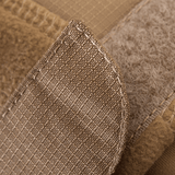 Detaljebillede af stoffet på M-Tac Norman Windblock Fleecejakke med Softshell-indlæg for optimal vindbeskyttelse.