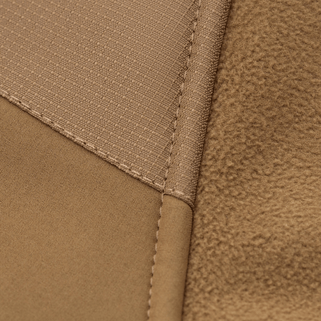 Nærbillede af M-Tac Norman Windblock Fleecejakke materiale, der viser detaljeret WindBlock og Softshell-stofstruktur.