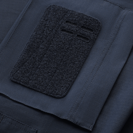 Detaljeret visning af M-Tac Jakke Patrol Flex med velcro-område til patches og navneskilte. Ideel til taktisk brug og forstærket holdbarhed.