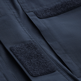Detaljer fra M-Tac Jakke Patrol Flex med Velcro-lukning og robust design egnet til taktisk brug.