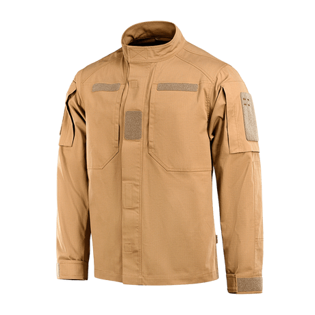 M-Tac Jakke Patrol Flex i beige med Velcro-detaljer, ståkrave og forstærket skulderparti, designet til taktisk brug.