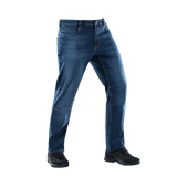 M-Tac Tactical Gen.I Regular Fit jeans i blå denim står oprejst mod en hvid baggrund, med sorte sko, viser jeans' design og pasform.