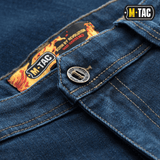 M-Tac Tactical Gen.I Regular Fit jeans i blå denim med detalje af knap og logo på mærket. Perfekt til taktisk brug og hverdagskomfort.