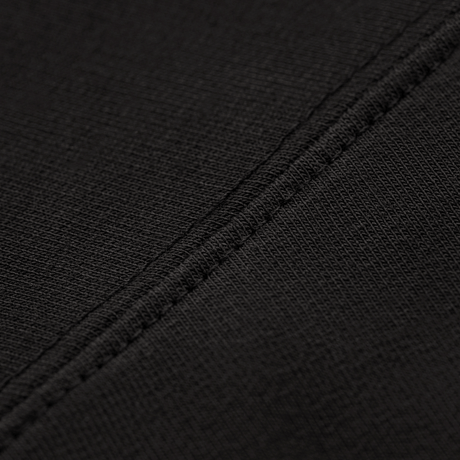 Detaljebillede af M-Tac Pullover 4 Seasons tekstur og syning, lavet af 95% bomuld og 5% elastan for alsidig brug hele året.