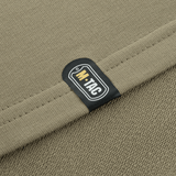 Nærbillede af M-Tac Pullover 4 Seasons med strækfast elastisk stofetiket, perfekt til hverdagsbrug og taktiske aktiviteter hele året.
