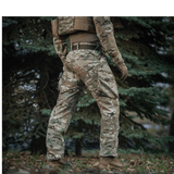 M-Tac Feltbukser NYCO i camouflage, holdbare feltbukser i slidstærkt materiale, ideelle til udendørs aktiviteter og militær brug.