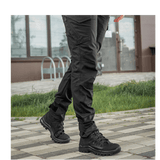 M-Tac Bukser Aggressor Dame Flex i brug udendørs, designet til træning og forretningsaktiviteter, lavet af let, Teflon-imprægneret materiale.