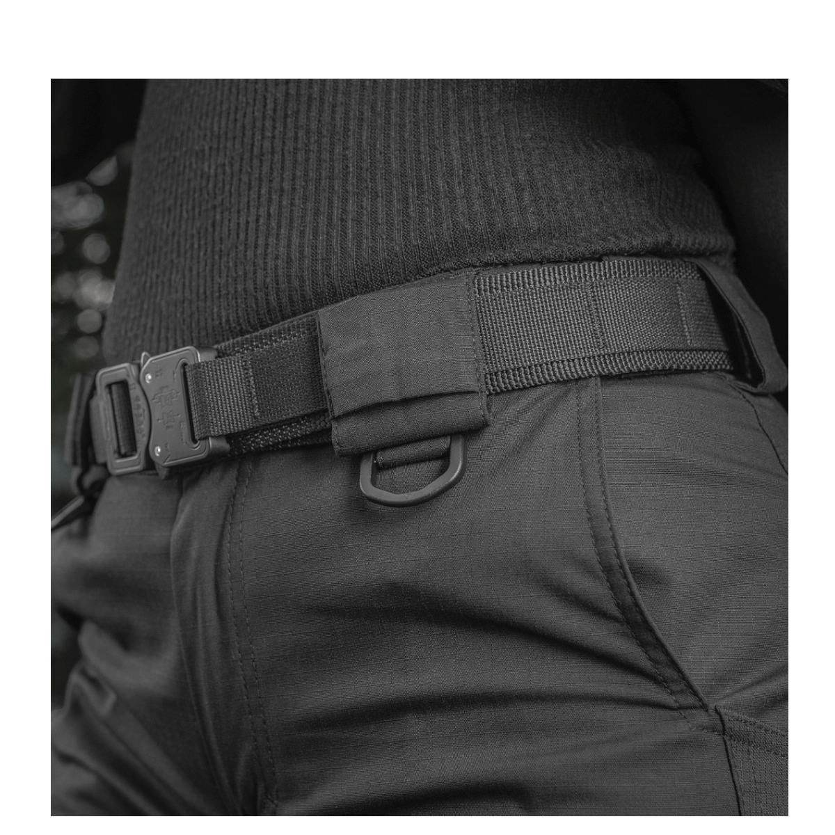 M-Tac Bukser Aggressor Dame Flex, tæt på syning og detalje af vandafvisende materiale, velegnet til træning og forretningsrejser.