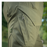 Nærbillede af M-Tac Bukser Aggressor Dame Flex med glat, teflon-impregneret materiale og lynlåsdetaljer, ideel til udendørs brug.