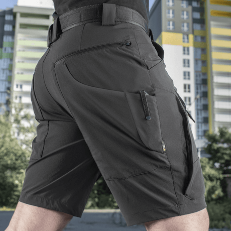 M-Tac Shorts Rubicon Flex i mørk oliven, designet til sommerbrug med komfort og funktionalitet, cargo-lommer og "4-Way Stretch" materiale.