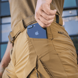 M-Tac Shorts Rubicon Flex i mørk olivengrøn med cargo-lommer og mobiltelefonopbevaring, ideelle til sommerbrug og funktionalitet.