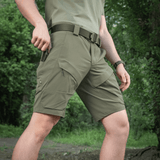 M-Tac Shorts Rubicon Flex i mørke oliven med cargolommer og 4-vejs stretch for komfort og bevægelsesfrihed udendørs.