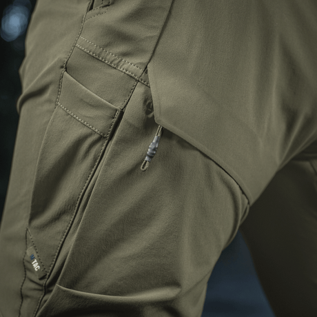 M-Tac Bukser Rubicon Flex med innovativ cargo-lomme design og YKK hardware, lavet af vandtæt og åndbart stretch stof. 85% nylon, 15% spandex.