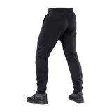 Sorte M-Tac Bukser Stealth Cotton i 100% bomuld, set bagfra, med elastik i taljen og åbne sidelommer for maksimal komfort.