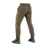 M-Tac Bukser Stealth Cotton, brune bomuldsbukser, bagfra, med elastik i taljen og sidelommer, i en sportslig stil for bevægelsesfrihed.