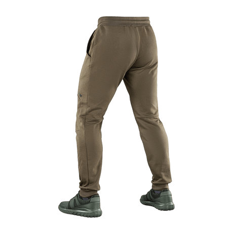 M-Tac Bukser Stealth Cotton, brune bomuldsbukser, bagfra, med elastik i taljen og sidelommer, i en sportslig stil for bevægelsesfrihed.