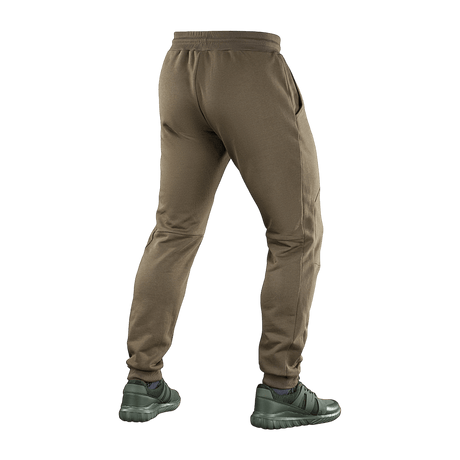 M-Tac Bukser Stealth Cotton i brun, alsidige sportsbukser til løb og fitness, lavet af 100% bomuld med elastik i taljen.