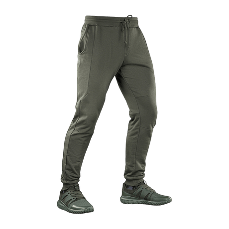 M-Tac Bukser Stealth Cotton i olivengrøn farve med to sidelommer og elastik, designet til komfort og bevægelsesfrihed under sport.