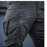 M-Tac Bukser Army NYCO Extreme i slidstærkt, åndbart stof med lynlåslommer og elastiske materialer for øget komfort og holdbarhed.