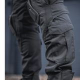 M-Tac Bukser Army NYCO Extreme i holdbart NYCO-stof til funktionalitet og komfort i taktiske miljøer, close-up visning.