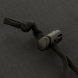 Nærbillede af M-Tac Panama Rip-Stop snor og lukning i sort, viser detaljeret rip-stop materiale.