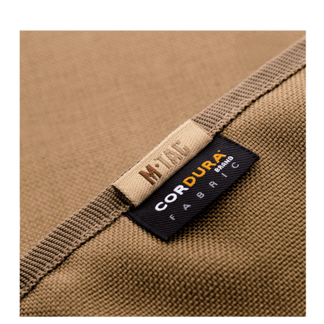 M-Tac Pung Elite lavet af slidstærk Cordura nylon stof med mærkater, stilfuld design til taktiske og daglige behov.