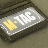 M-Tac Pung Elite Gen.II i slidstærkt Cordura 500D med stilfuldt logo og PVC beskyttelse.
